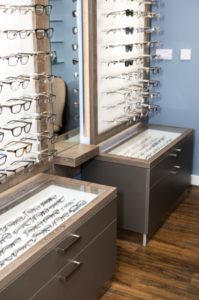 Glass top drawer frame display for opticians retail space Designed by Mewscraft