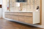 Harrold Opticians retail storage after commercial Interior design and refurbishment by Mewscraft 